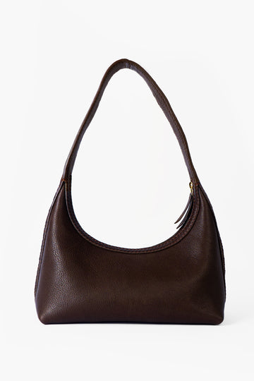 Elegant mocha brown, vegetable tanned leather bag, handcrafted with braided sides and refined zipper. Made in Germany by Alina Schürfeld. 