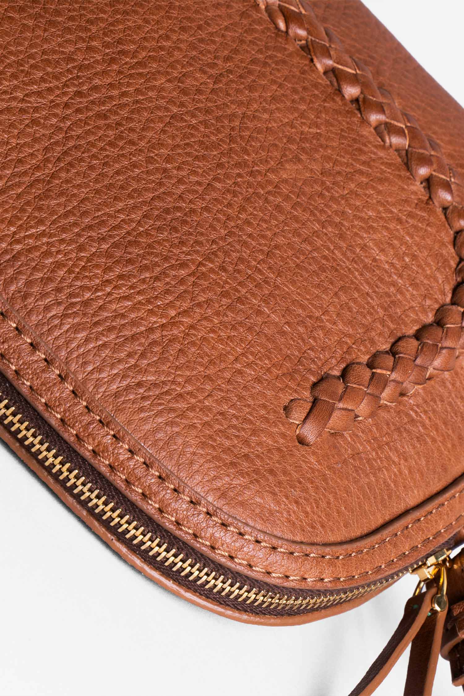 SKAI Signature Braiding and Gold Zipper Detail Caught in Cognac Alina Schürfeld Made in Hamburg
