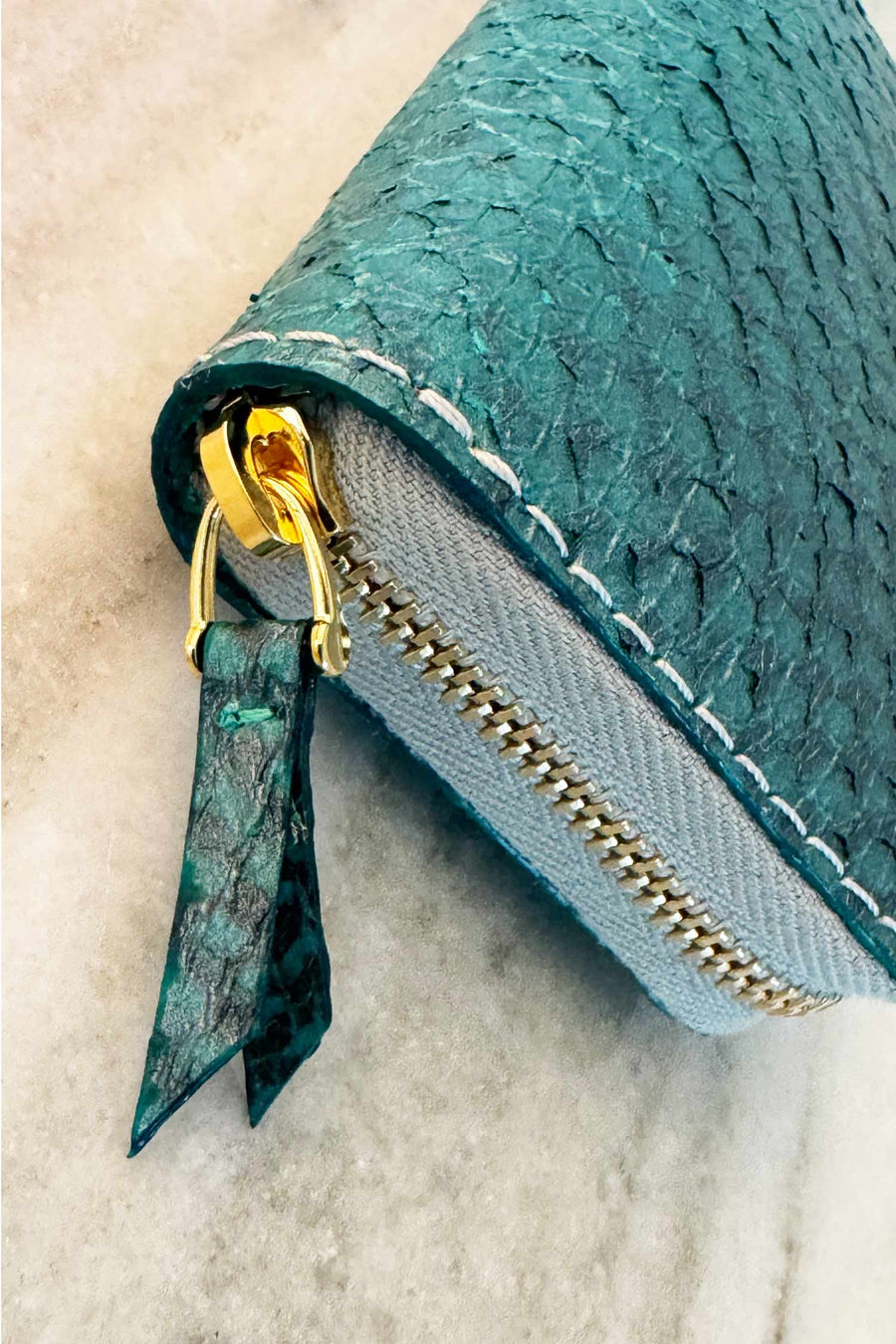 The URSULINA Wallet. Beautiful in style and in substance. Made in Germany from chrome-free tanned salmon leather. Produced locally in Hamburg by Alina Schürfeld. 