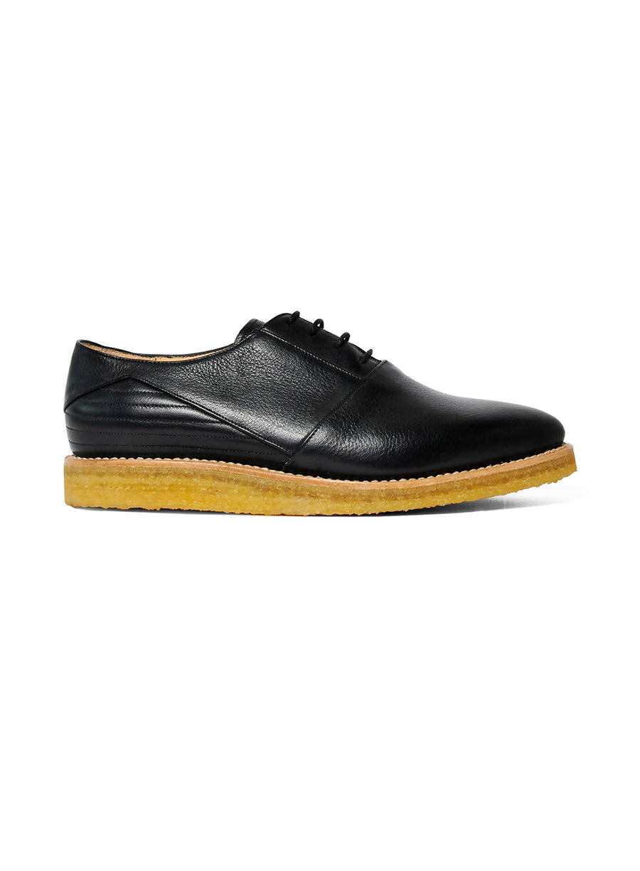 Goodyear welted, black coloured sustainable flat shoe with a crepe sole by ALINASCHUERFELD