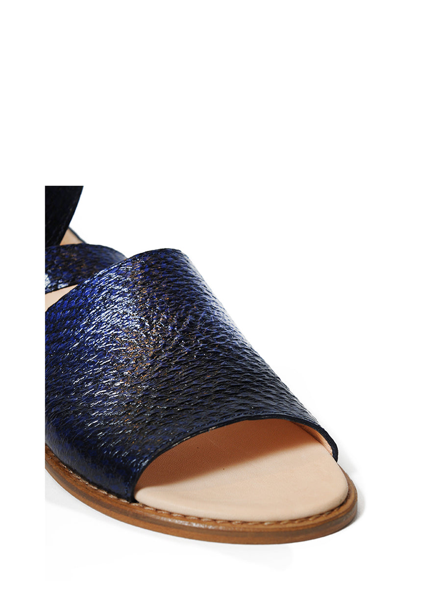 Blue coloured sustainable sandal with golden buckles by ALINASCHUERFELD